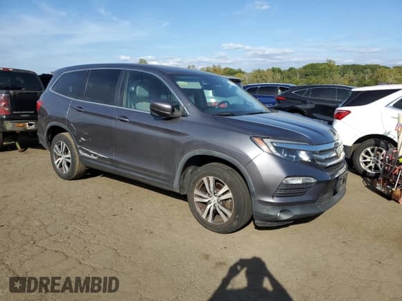 ✅ 2017 Honda Pilot EX-L • VIN: 5FNYF6H60HB103137 • Lot: 81610055. Listed on Copart with 116,919 mi. Free auction sales archive from the USA and detailed vehicle history report at DreamBid. Image 4.