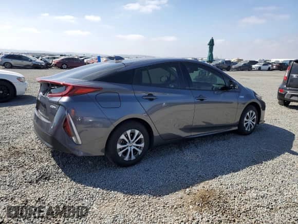 2020 Toyota Prius LE с VIN JTDKARFP7L3134814, выставлен на аукционе Copart как лот 84899765 с пробегом 16 798 миль миль и Списание • Salvage title. История ставок и продаж доступна на DreamBid. Изображение 3.