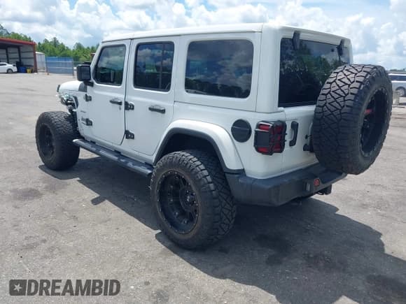 ✅ 2021 Jeep Wrangler Unlimited Sahara Altitude • VIN: 1C4HJXEN7MW518395 • Lot: 42484314. Listed on IAAI with 55,000 mi. Free auction sales archive from the USA and detailed vehicle history report at DreamBid. Image 3.
