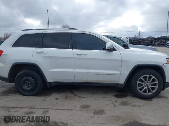 ✅ 2015 Jeep Grand Cherokee Limited • VIN: 1C4RJEBGXFC792614 • Lot: 43646750. Wystawiony na IAAI z przebiegiem 227 872 mil. Bezpłatny archiwum sprzedaży aukcyjnych z USA i szczegółowy raport historii pojazdu na DreamBid. Zdjęcie 13.