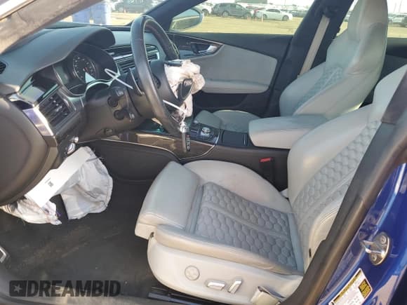 ✅ 2016 Audi RS 7 Prestige • VIN: WUAW2BFC6GN901598 • Lot: 65653574. Wystawiony na Copart z przebiegiem 97 055 mil. Bezpłatny archiwum sprzedaży aukcyjnych z USA i szczegółowy raport historii pojazdu na DreamBid. Zdjęcie 7.