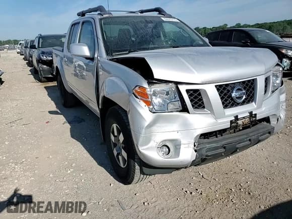 ✅ 2012 Nissan Frontier Pro-4X • VIN: 1N6AD0EV3CC405900 • Lot: 63515115. Listed on Copart with 61,015 mi. Free auction sales archive from the USA and detailed vehicle history report at DreamBid. Image 13.