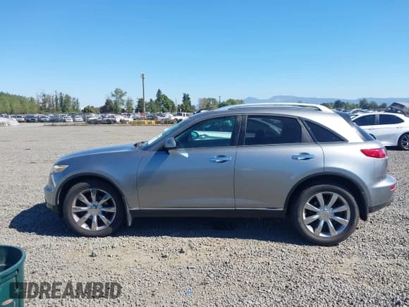 ✅ 2004 Infiniti FX • VIN: JNRAS08W34X220284 • Лот: 43248850. Опубликован ранее на IAAI с пробегом 184 495 миль. Бесплатный доступ к архиву аукционных продаж из США и подробный отчёт об истории автомобиля на DreamBid. Изображение 14.