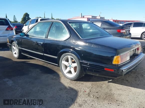 ✅ 1989 BMW 6 Series • VIN: WBAEC8414K3268417 • Lot: 43906535. Listed on IAAI with 85,008 mi. Free auction sales archive from the USA and detailed vehicle history report at DreamBid. Image 3.