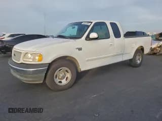 ✅ 1999 Ford F-150 • VIN: 1FTRX17W9XKC26491 • Lot: 94941885. Wystawiony na Copart z przebiegiem Nie podano. Bezpłatny archiwum sprzedaży aukcyjnych z USA i szczegółowy raport historii pojazdu na DreamBid. Zdjęcie 1.