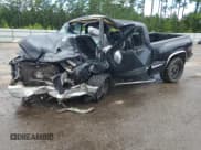 ✅ 1999 GMC Sierra 1500 SLE • VIN: 1GTEK19T0XZ537279 • Лот: 68516285. Опубликован ранее на Copart с пробегом Не указан. Бесплатный доступ к архиву аукционных продаж из США и подробный отчёт об истории автомобиля на DreamBid. Изображение 1.