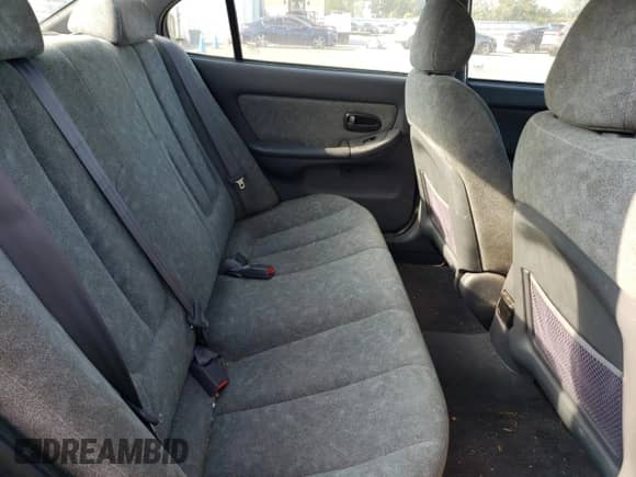 2003 Hyundai Elantra GLS z VIN KMHDN45DX3U590030, wystawiony jako Copart lot #69869194 z przebiegiem 161 175 mil mil oraz Czysty tytuł • Clean title. Historia ofert i sprzedaży dostępna na DreamBid. Obrazek 10.