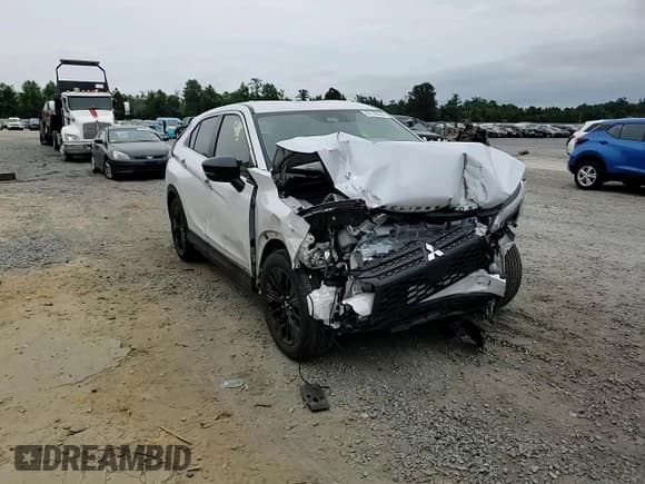 ✅ 2022 Mitsubishi Eclipse Cross LE • VIN: JA4ASVAA1NZ013596 • Lot: 62138864. Listed on Copart with 22,683 mi. Free auction sales archive from the USA and detailed vehicle history report at DreamBid. Image 11.