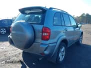 ✅ 2004 Toyota RAV4 • VIN: JTEHD20V640036226 • Lot: 43867870. Listed on IAAI with 187,271 mi. Free auction sales archive from the USA and detailed vehicle history report at DreamBid. Image 4.