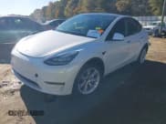 ✅ 2021 Tesla Model Y Standard Range • VIN: 5YJYGDED4MF109604 • Lot: 43591888. Listed on IAAI with 61,086 mi. Free auction sales archive from the USA and detailed vehicle history report at DreamBid. Image 20.