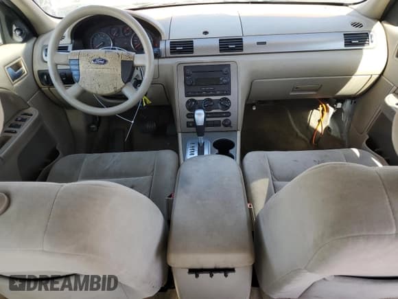 ✅ 2006 Ford Five Hundred SE • VIN: 1FAHP23106G163977 • Lot: 63364034. Wystawiony na Copart z przebiegiem 288 399 mil. Bezpłatny archiwum sprzedaży aukcyjnych z USA i szczegółowy raport historii pojazdu na DreamBid. Zdjęcie 8.