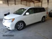 ✅ 2010 Honda Odyssey Touring • VIN: 5FNRL3H92AB079662 • Lot: 89865135. Listed on Copart with 145,766 mi. Free auction sales archive from the USA and detailed vehicle history report at DreamBid. Image 1.