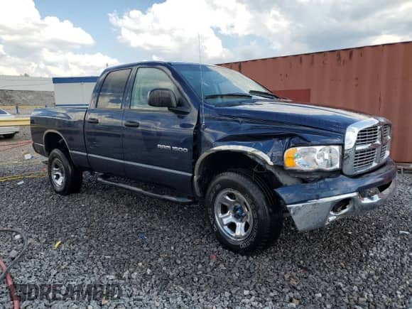 2004 Dodge 1500 SLT with VIN 1D7HU18D74S787369, listed as a Copart auction lot 70160865 with 228,856 mi miles and Salvage title. Bid and sale history available at DreamBid. Image 4.