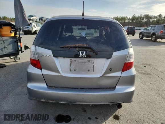 ✅ 2009 Honda Fit • VIN: JHMGE88269S054472 • Lot: 91581785. Listed on Copart with 223,819 mi. Free auction sales archive from the USA and detailed vehicle history report at DreamBid. Image 6.