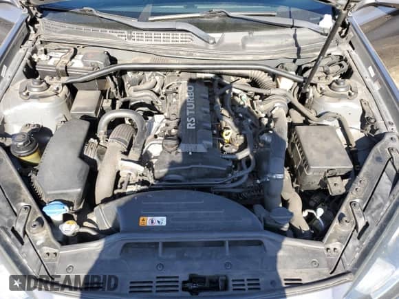 2014 Hyundai Genesis Coupe 2.0T z VIN KMHHT6KD4EU119078, wystawiony jako Copart lot #86022114 z przebiegiem 144 039 mil mil oraz Szkoda całkowita • Salvage title. Historia ofert i sprzedaży dostępna na DreamBid. Obrazek 11.