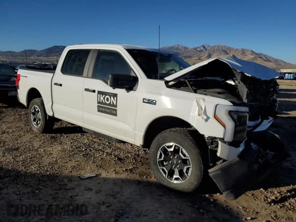 ✅ 2024 Ford F-150 Lightning Pro • VIN: 1FT6W1B78RWG05905 • Lot: 82747715. Listed on Copart with 16,636 mi. Free auction sales archive from the USA and detailed vehicle history report at DreamBid. Image 4.