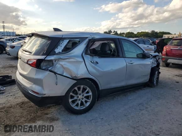 ✅ 2018 Chevrolet Equinox LS • VIN: 2GNAXHEV0J6344625 • Lot: 86138285. Wystawiony na Copart z przebiegiem 89 205 mil mil. Skorzystaj z bezpłatnego archiwum sprzedaży aukcyjnych z USA i zobacz szczegółowy raport historii pojazdu na DreamBid. Zdjęcie 3.