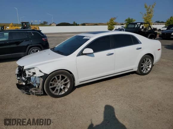 2012 Chevrolet Malibu LTZ with VIN 1G1ZG5E74CF328974, listed as a Copart auction lot 70752244 with 153,706 mi miles and Non repairable. Bid and sale history available at DreamBid. Image 1.