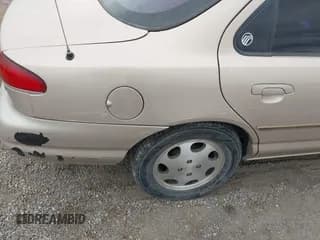 ✅ 1999 Mercury Mystique GS • VIN: 1MEFM6538XK606647 • Лот: 41613999. Опубликован ранее на IAAI с пробегом 90 978 миль. Бесплатный доступ к архиву аукционных продаж из США и подробный отчёт об истории автомобиля на DreamBid. Изображение 6.