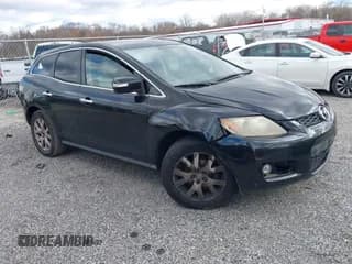 ✅ 2009 Mazda CX-7 Grand Touring • VIN: JM3ER29L790219577 • Lot: 43716713. Wystawiony na IAAI z przebiegiem 186 929 mil. Bezpłatny archiwum sprzedaży aukcyjnych z USA i szczegółowy raport historii pojazdu na DreamBid. Zdjęcie 1.