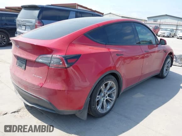 ✅ 2023 Tesla Model Y Long Range • VIN: 7SAYGAEE7PF691499 • Lot: 42038850. Listed on IAAI with 26,439 mi. Free auction sales archive from the USA and detailed vehicle history report at DreamBid. Image 4.