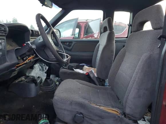 1996 Chevrolet S-10 LS with VIN 1GCCS1948TK167699, listed as a Copart auction lot 85314574 with 157,896 mi miles and Salvage title. Bid and sale history available at DreamBid. Image 7.