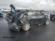 ✅ 2023 Tesla Model Y Long Range • VIN: 7SAYGAEE0PF621018 • Лот: 92168355. Опубликован ранее на Copart с пробегом Не указан. Бесплатный доступ к архиву аукционных продаж из США и подробный отчёт об истории автомобиля на DreamBid. Изображение 3.