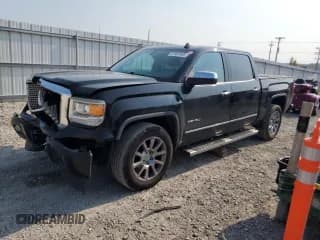 ✅ 2014 GMC Sierra 1500 Denali • VIN: 3GTU2WEC5EG308012 • Lot: 67007895. Listed on Copart with 143,833 mi. Free auction sales archive from the USA and detailed vehicle history report at DreamBid. Image 1.