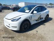 ✅ 2023 Tesla Model Y Long Range • VIN: 7SAYGDEE7PA123770 • Лот: 43191209. Опубликован ранее на IAAI с пробегом 33 084 миль. Бесплатный доступ к архиву аукционных продаж из США и подробный отчёт об истории автомобиля на DreamBid. Изображение 21.