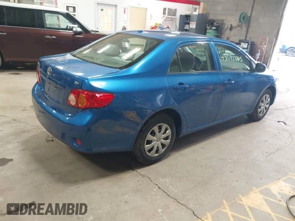 ✅ 2010 Toyota Corolla LE • VIN: JTDBU4EE0AJ069842 • Lot: 43591865. Listed on IAAI with 91,471 mi. Free auction sales archive from the USA and detailed vehicle history report at DreamBid. Image 4.