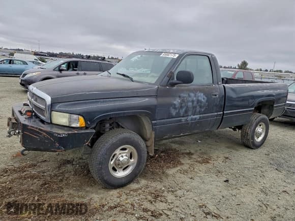 ✅ 2002 Dodge RAM • VIN: 3B7KF26W12M309202 • Lot: 95882175. Listed on Copart with Not provided. Free auction sales archive from the USA and detailed vehicle history report at DreamBid. Image 1.