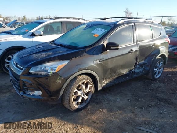✅ 2014 Ford Escape Titanium • VIN: 1FMCU9J95EUE23378 • Lot: 43621529. Listed on IAAI with 109,364 mi. Free auction sales archive from the USA and detailed vehicle history report at DreamBid. Image 17.