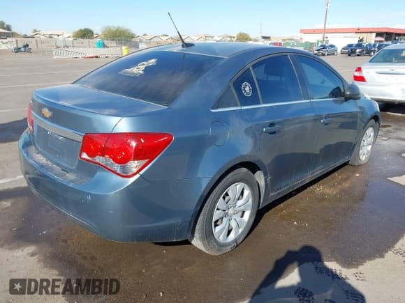 ✅ 2012 Chevrolet Cruze LS • VIN: 1G1PC5SHXC7271139 • Lot: 41441993. Listed on IAAI with 140,440 mi. Free auction sales archive from the USA and detailed vehicle history report at DreamBid. Image 4.