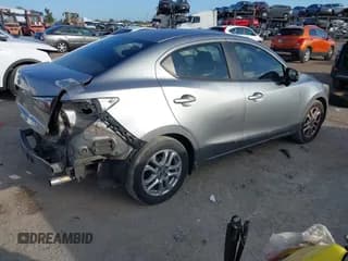 ✅ 2016 Toyota Yaris • VIN: 3MYDLBYV6GY115112 • Lot: 43644856. Listed on IAAI with 165,209 mi. Free auction sales archive from the USA and detailed vehicle history report at DreamBid. Image 4.