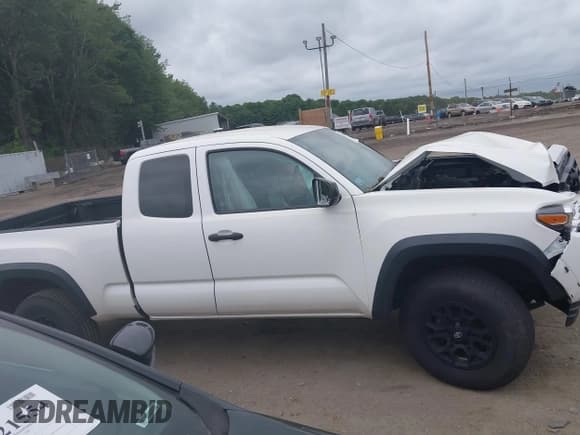 ✅ 2020 Toyota Tacoma SR • VIN: 3TYSX5EN1LT000276 • Lot: 42673254. Listed on IAAI with 57,374 mi. Free auction sales archive from the USA and detailed vehicle history report at DreamBid. Image 13.