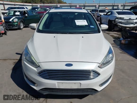 ✅ 2018 Ford Focus Titanium • VIN: 1FADP3N26JL271708 • Lot: 43531238. Listed on IAAI with 154,503 mi. Free auction sales archive from the USA and detailed vehicle history report at DreamBid. Image 13.