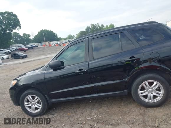✅ 2012 Hyundai Santa Fe GLS • VIN: 5XYZGDAG2CG144556 • Lot: 42596221. Listed on IAAI with 164,813 mi. Free auction sales archive from the USA and detailed vehicle history report at DreamBid. Image 6.