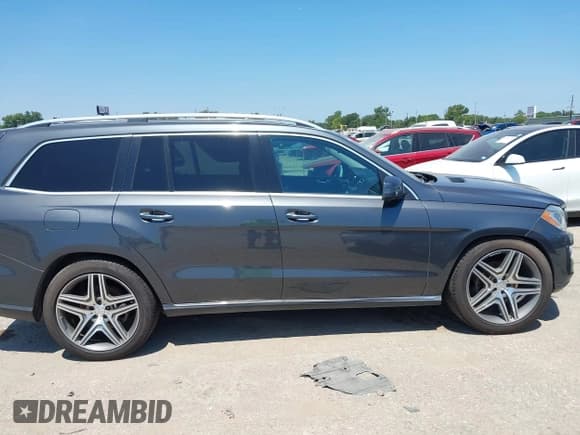 ✅ 2014 Mercedes-Benz GL 450 • VIN: 4JGDF7CE0EA319735 • Лот: 43159331. Опубликован ранее на IAAI с пробегом 81 718 миль. Бесплатный доступ к архиву аукционных продаж из США и подробный отчёт об истории автомобиля на DreamBid. Изображение 13.