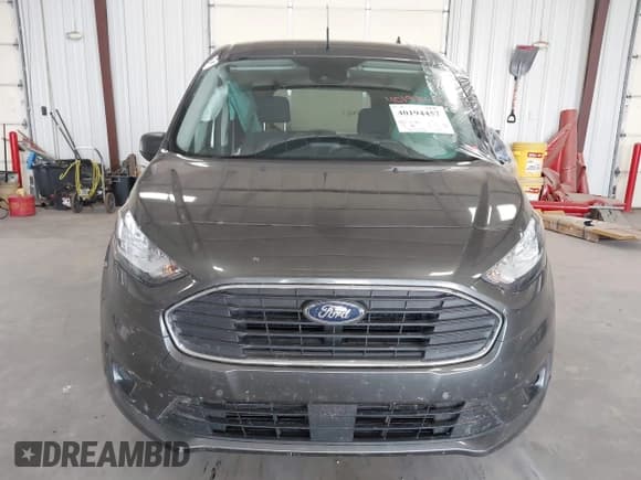 ✅ 2022 Ford Transit Connect XLT • VIN: NM0GE9F24N1543380 • Lot: 40194457. Listed on IAAI with 26,050 mi. Free auction sales archive from the USA and detailed vehicle history report at DreamBid. Image 12.