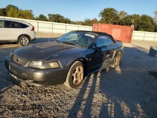 ✅ 2004 Ford Mustang Deluxe • VIN: 1FAFP446X4F197912 • Lot: 92419475. Listed on Copart with 150,977 mi. Free auction sales archive from the USA and detailed vehicle history report at DreamBid. Image 1.