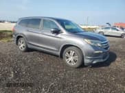 ✅ 2017 Honda Pilot EX-L • VIN: 5FNYF5H73HB023284 • Lot: 72001945. Listed on Copart with 201,850 mi. Free auction sales archive from the USA and detailed vehicle history report at DreamBid. Image 4.