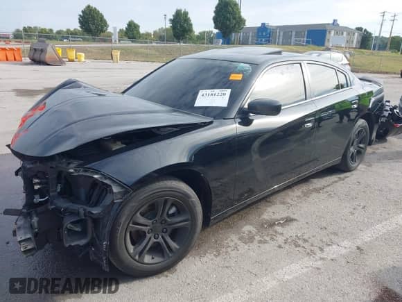 2022 Dodge Charger SXT with VIN 2C3CDXBG7NH220263, listed as a IAAI auction lot 43181220 with 70,888 mi miles and . Bid and sale history available at DreamBid. Image 18.