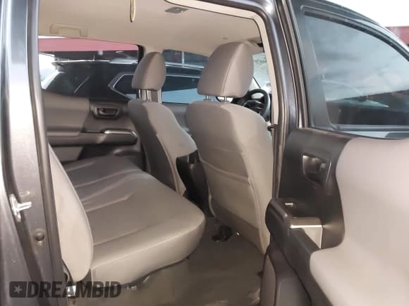 ✅ 2023 Toyota Tacoma SR5 • VIN: 3TMAZ5CN6PM199982 • Lot: 43087053. Listed on IAAI with 38,883 mi. Free auction sales archive from the USA and detailed vehicle history report at DreamBid. Image 8.