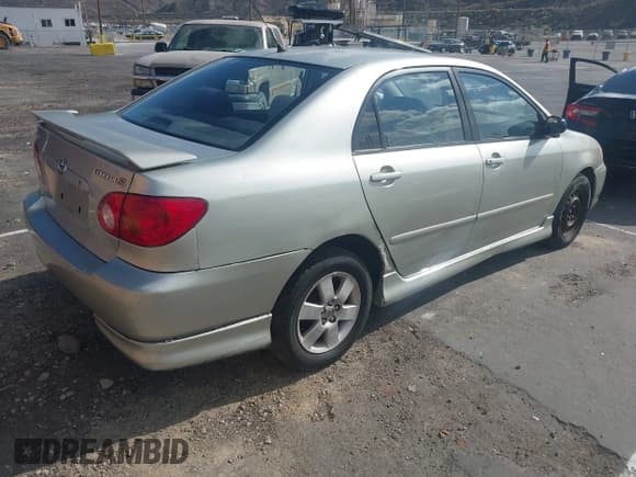 ✅ 2003 Toyota Corolla CE • VIN: 1NXBR32E43Z104217 • Lot: 43709581. Listed on IAAI with 234,070 mi. Free auction sales archive from the USA and detailed vehicle history report at DreamBid. Image 4.