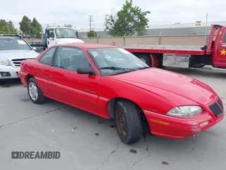 ✅ 1995 Pontiac Grand Am • VIN: 1G2NE15D8SM591364 • Lot: 42109395. Listed on IAAI with 140,629 mi. Free auction sales archive from the USA and detailed vehicle history report at DreamBid. Image 1.