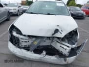 ✅ 2005 Ford Focus S • VIN: 1FAFP34N95W195622 • Lot: 43724712. Listed on IAAI with Not provided. Free auction sales archive from the USA and detailed vehicle history report at DreamBid. Image 6.