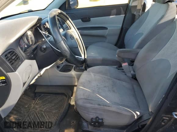 2011 Hyundai Accent GLS z VIN KMHCN4AC1BU606400, wystawiony jako Copart lot #76609004 z przebiegiem 226 486 mil mil oraz Szkoda całkowita • Salvage title. Historia ofert i sprzedaży dostępna na DreamBid. Obrazek 7.