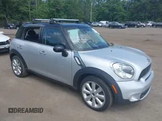 ✅ 2014 MINI Countryman S • VIN: WMWZC3C50EWP28250 • Lot: 42694859. Listed on IAAI with 102,802 mi. Free auction sales archive from the USA and detailed vehicle history report at DreamBid. Image 1.