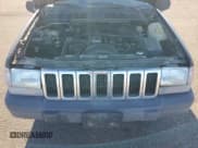 ✅ 1996 Jeep Grand Cherokee Laredo • VIN: 1J4GZ58S4TC213568 • Lot: 85765615. Listed on Copart with Not provided. Free auction sales archive from the USA and detailed vehicle history report at DreamBid. Image 11.