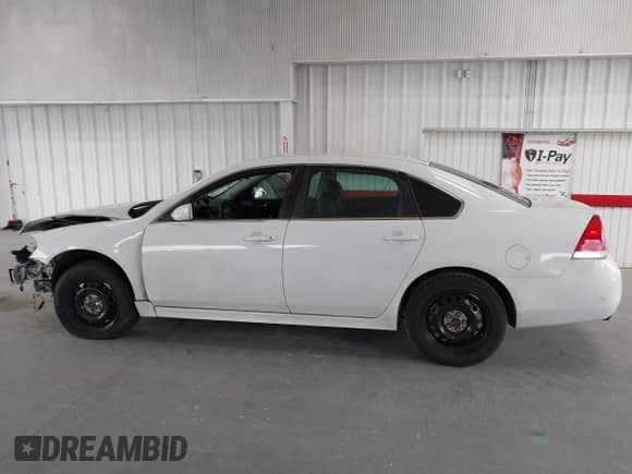 2014 Chevrolet Impala Police Police with VIN 2G1WD5E36E1133932, listed as a IAAI auction lot 42588380 with 174,405 mi miles and . Bid and sale history available at DreamBid. Image 15.